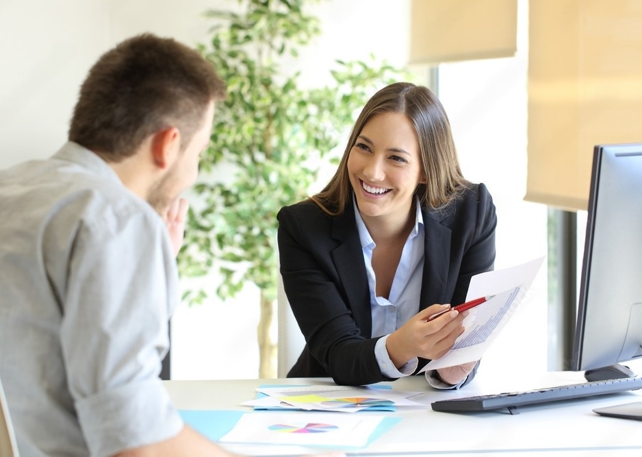 a business meeting between a man and a woman.