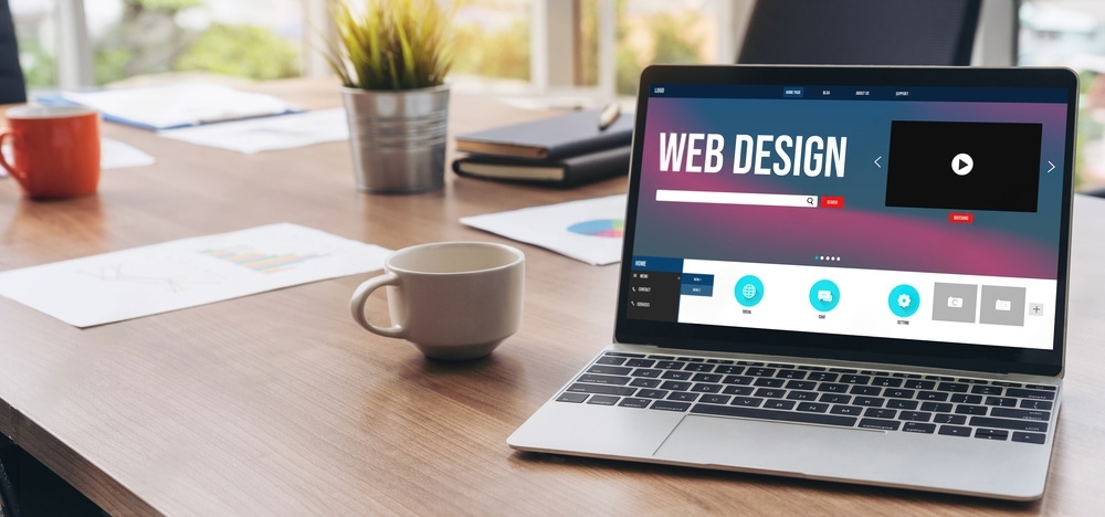 a laptop with the words 'web design'