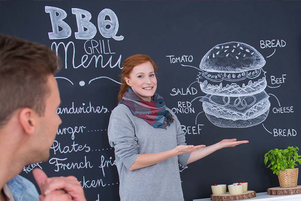 businesswoman talking about food or a menu item